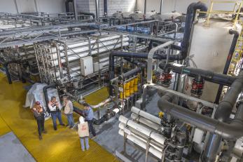 Mercy corps employees visiting a water desalination plant in gaza.