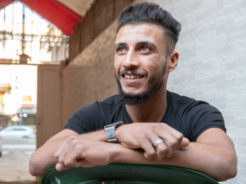 A person sitting in a chair.